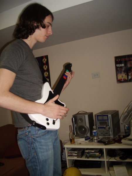 Timothy playing Guitar Hero