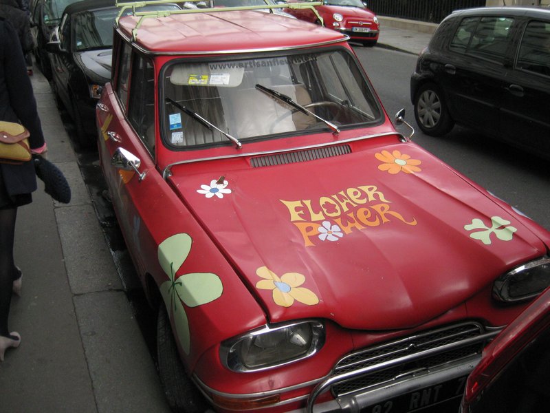 Cool car outside a flower shop