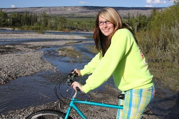 Kayla Riding Her Bike at the River 