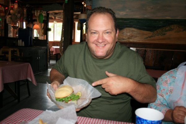 Tim had to show off his hamburger too !