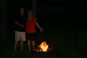 Lynn showing off her fire to Tim !