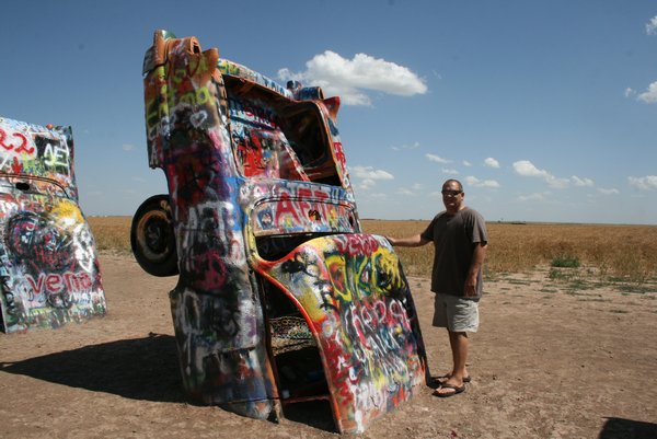 Tim with one of the cars at Cadillac Ranch just outside Amarillo, Texas