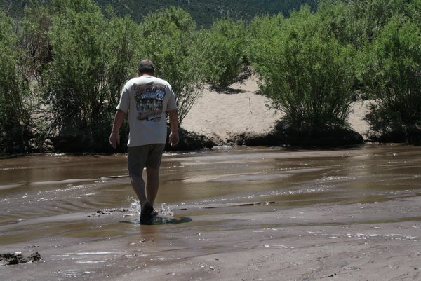 Crossing the little river at the sand dunes.