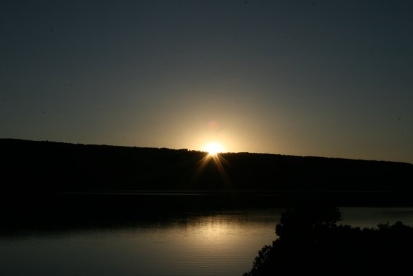 The sunsetting on a lake in Montrose, CO.