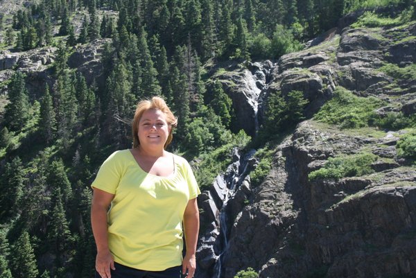 Me in front of a beautiful waterfall on the Million Dollar Highway.
