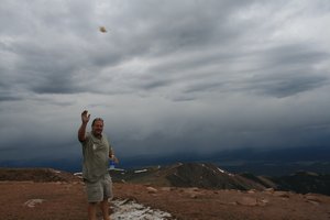 He's trying to pick another snowball fight.....this time on the top of Pikes Peak !