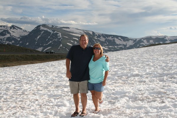On top of a mountain, in the snow, in shorts and flip-flops in Rocky Mountain National Park
