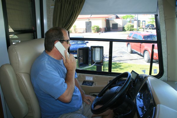 Tim talking on the phone at the McDonald's Drive-Thru window for Motorhomes !!