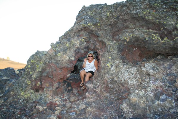 Climbing the volcanic rock at Craters of the Moon.