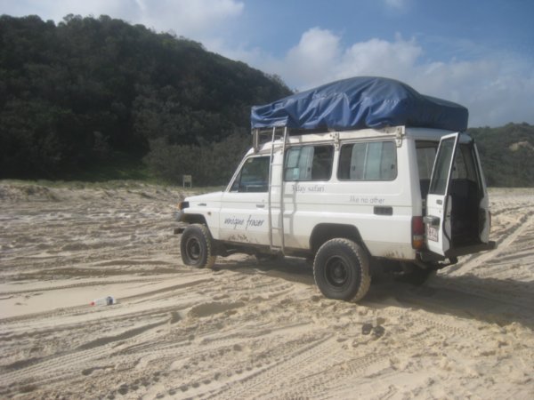 16. Our 4x4 vehicle parked up  on the beach, Fraser Island