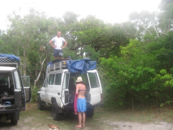 30. Ricky packing up the gear on the roof of the 4x4 on morning 2, Fraser Island