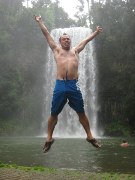 35. Jumping for joy in front of Millaa Millaa Falls, Atherton Tablelands