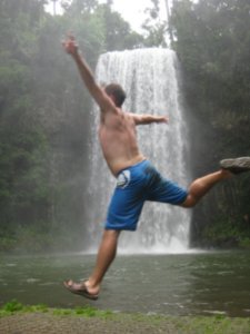 36. Jumping for joy in front of Millaa Millaa Falls, Atherton Tablelands
