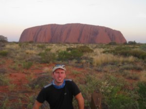 59. Sat in front of Uluru at sunset