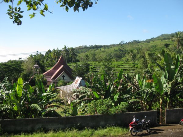 7. View of Church and rice terraces, Moni, flores