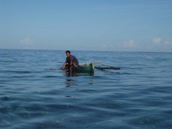 19. Fisherman & son, Moyo Island