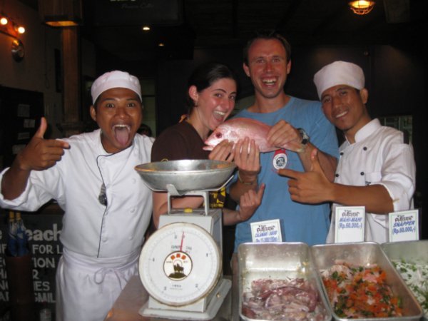 27. That snapper's got our name written all over it....me and Liz pose with our soon to become meal, Gili Trawangan