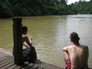 18. Danny & Rafael waiting on the jetty to be picked up by the longboat, Taman Negara