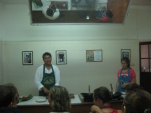 44. Somphon and Om demonstrating the next dish, Chiang Mai Cookery School