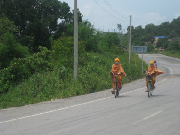 2. Monks riding along in Ban Donchai whilst I wait for the bus to Luang Namtha