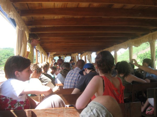 6. The boat down the Mekong river is packed with foreign tourists