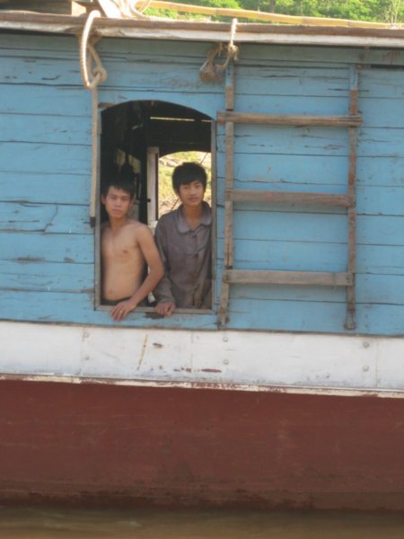 8. Laos boys watch our arrival at Pakbeng, Day 1 of the slowboat down the Mekong river