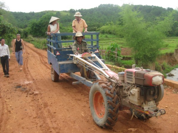 31. Getting a lift to a village from a Laos tractor, nr Phonsavon