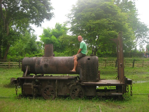 5. Sitting on an old steam engine, Don Khon