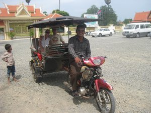 53. Neng, Trudi and Mike in the Moto outside Cheung Ek Killing Fields, near Phnom Penh