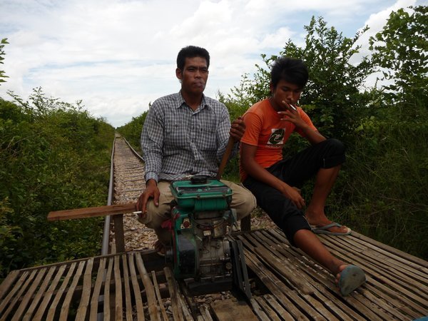6. The train drivers enjoy a cigarette, Bamboo Railway, Battambang
