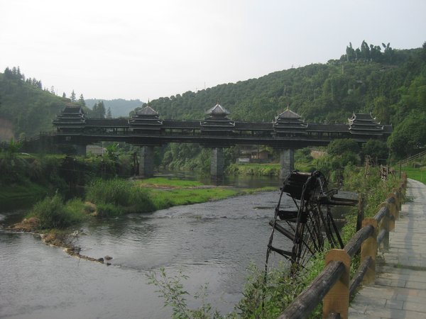 16. Chengyang Wind & Rain Bridge with one of the many  waterwheels in foreground