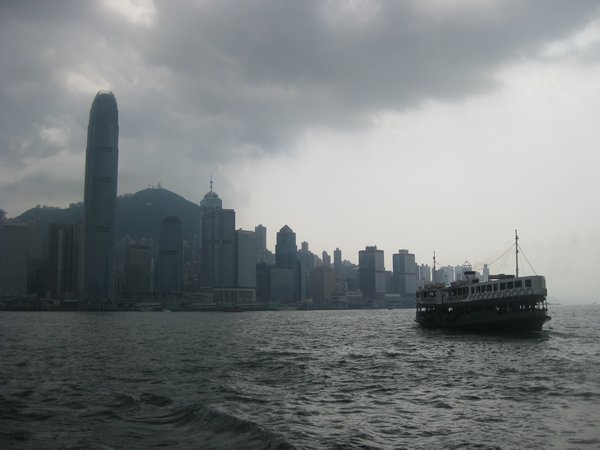17. The star ferry crossing Hong Kong Harbour with Hong Kong Island in the background
