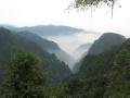 31. Cloud hovers above Emei Shan mountain range