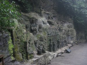 37. Qing figures carved into the rock on Emei Shan