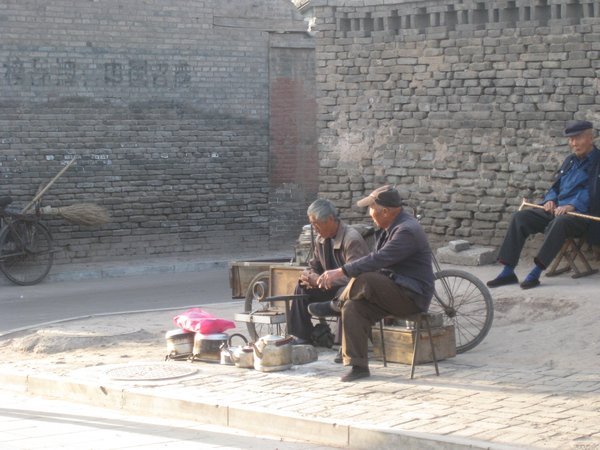 15. Two old men chatting in the street, Pingyao