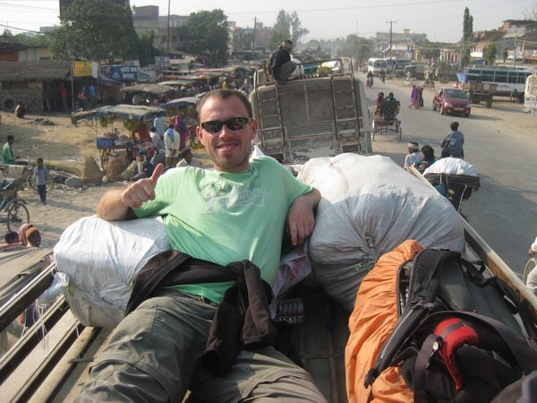 2. Riding on the roof of the bus to Lumbini
