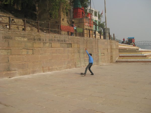 4. A boy playing cricket, Varanasi Ghats