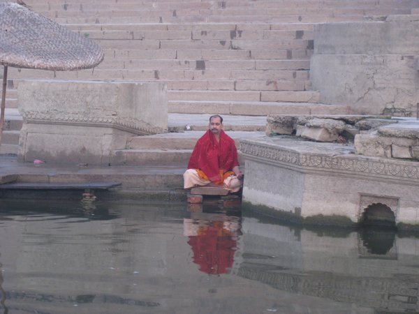35. A man deep in meditation on the Ghats, Varanasi