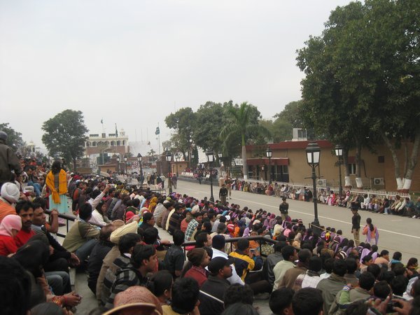 28. The crowd await in anticipation at the border-closing ceremony at the India-Pakistan border, near Amritsar