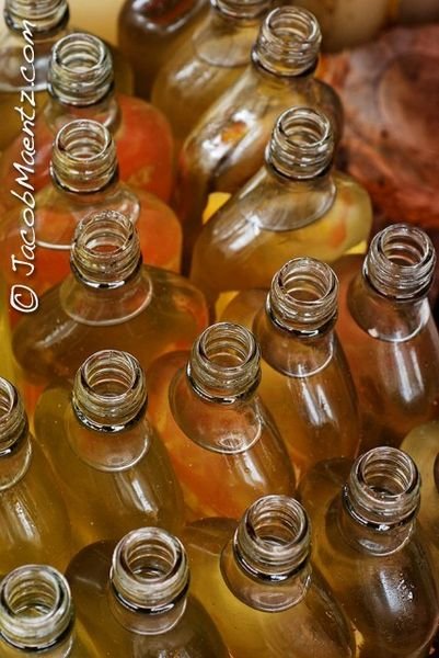 Coconut oil in rum bottles