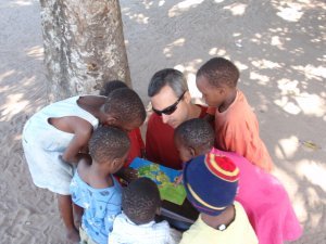 Reading to kids at Dondo