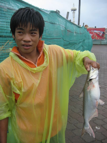 Child fisherman in Phnom Penh