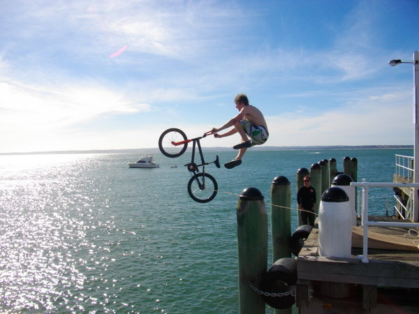 BMX riding off the pier in Phillip Island