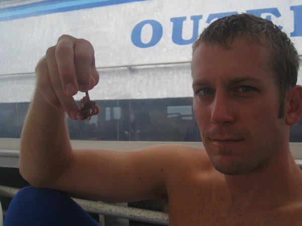 Jeff eating a little octopus