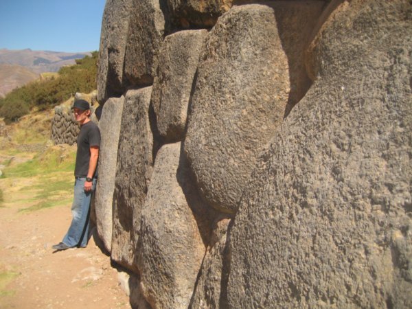 Jeff with the gaint rocks at  SacsayhuamÃ¡n Ruins