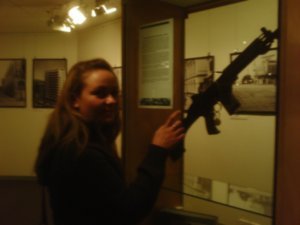 Hollie posing with gun