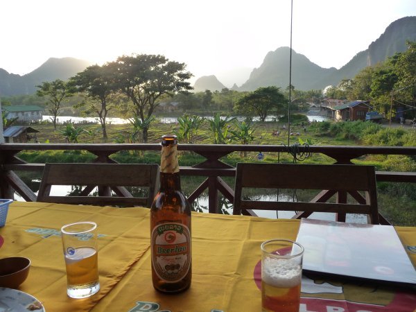 Enjoying the sunset and a cool Beerlao in Vang Vieng