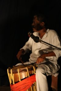Narrator Playing the Drums
