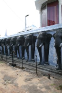 Elephants guard the entrance to this large Dagboe