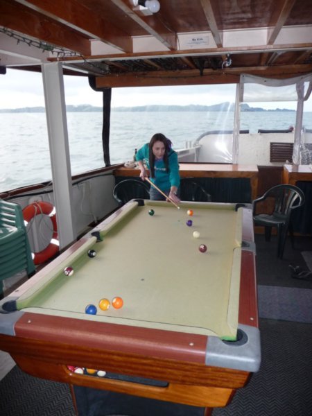 A boat with a pool table